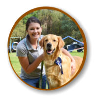 happy dog and owner after graduating from the mckaynine canine good citizen programme