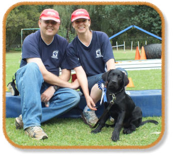 instructors with puppy class graduate