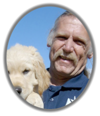 mckaynine dog training instructor steve with golden pup