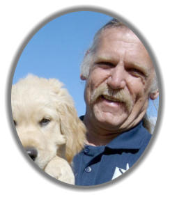 mckaynine dog training instructor steve with golden pup