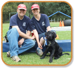 instructors with puppy class graduate
